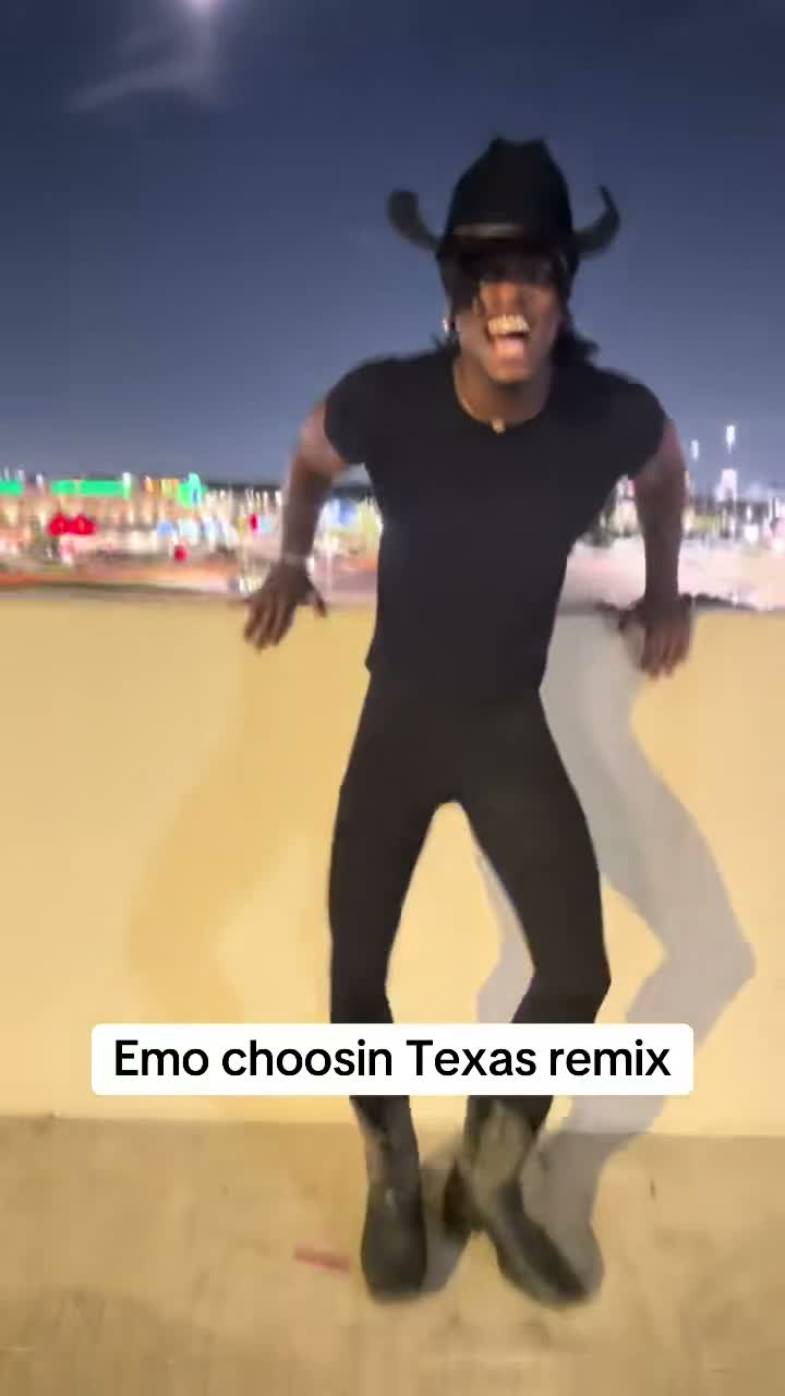Singer doing an emo cover on a parking garage roof at night, city lights behind, TikTok trend clip